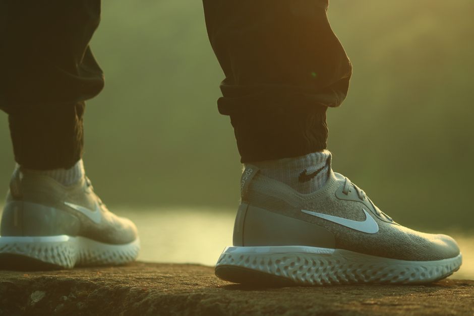 Close-up of Nike sneakers on a person outdoors. Casual lifestyle fashion.