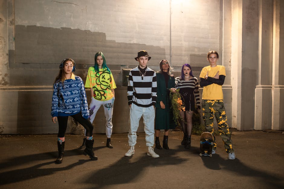 Group of diverse young adults showcasing contemporary street fashion and style.
